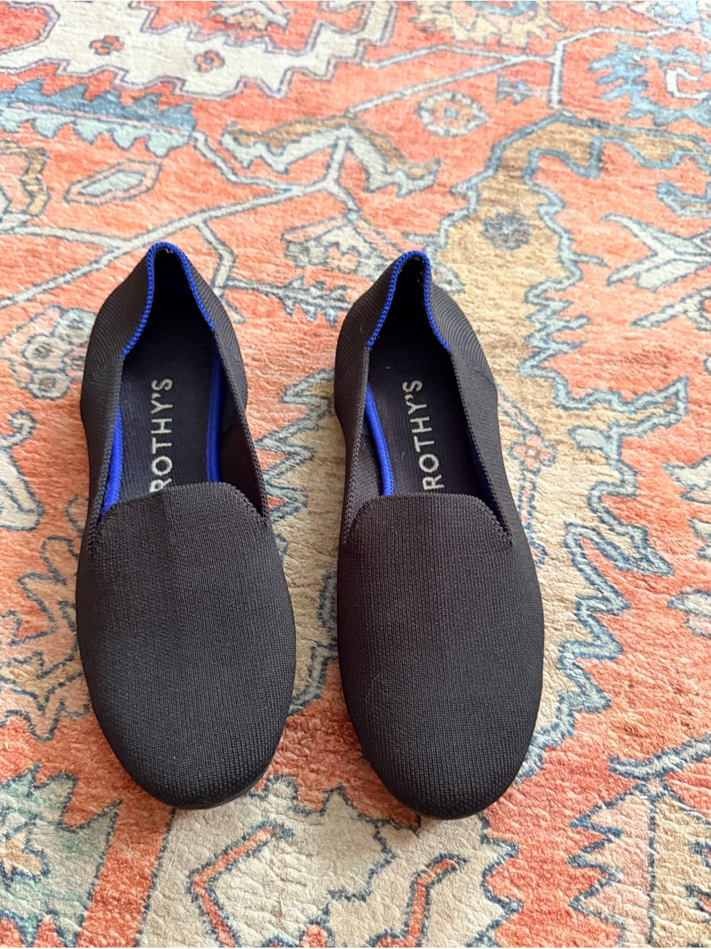 Rothy's Women’s Black Slip-On Loafers with Blue Trim